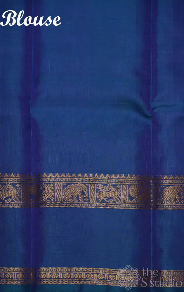 Light violet kanchi silk saree with checks and  parrot pallu